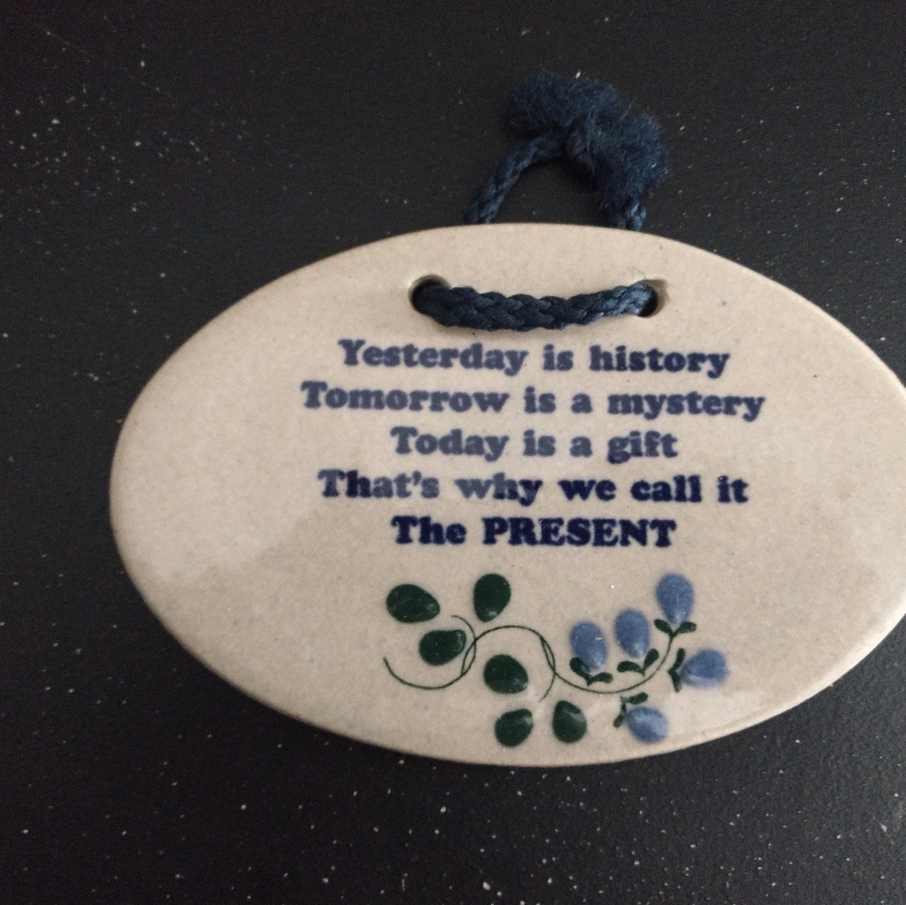 Yesterday, tomorrow, today sign